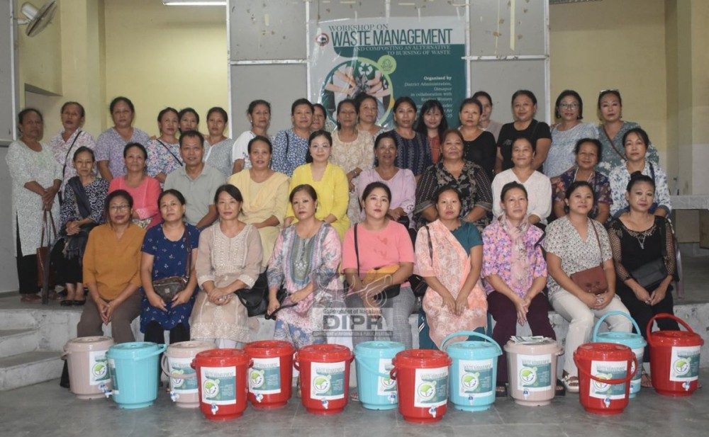 EAC Dimapur, Imlijungla along with the officials and woman community during a workshop held on waste management at Kevijau, Dimapur. (DIPR Photo)